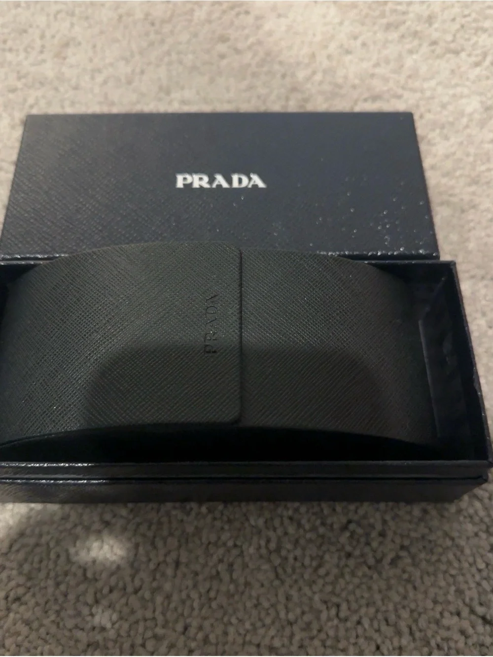 Prada Black Round Sunglasses with Brown-Tinted Lenses